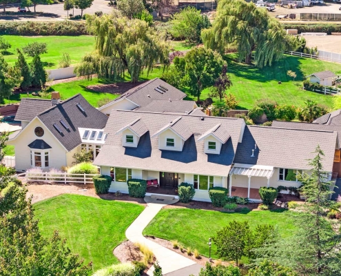 ashland-home-renovation-normal-3 aerial exterior view of renovated large Ashland, Oregon home with pool and view