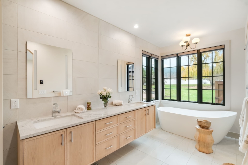 ashland-home-renovation-normal-7 redesigned and remodeled master bathroom with tiled walls and floors, floating cabinet and soaking tub in Ashland, Oregon home