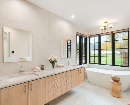 ashland-home-renovation-normal-7 redesigned and remodeled master bathroom with tiled walls and floors, floating cabinet and soaking tub in Ashland, Oregon home