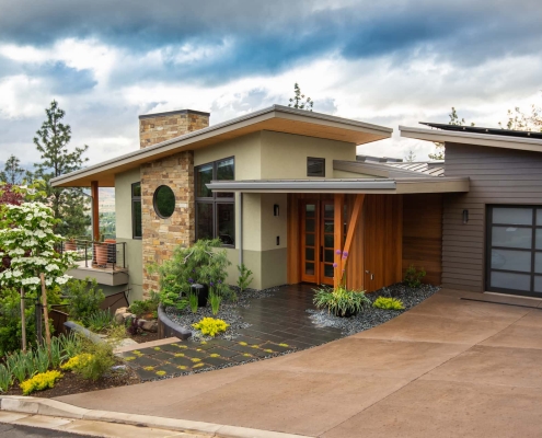 modern home exterior design with landscaping and hilltop view in Ashland, Oregon